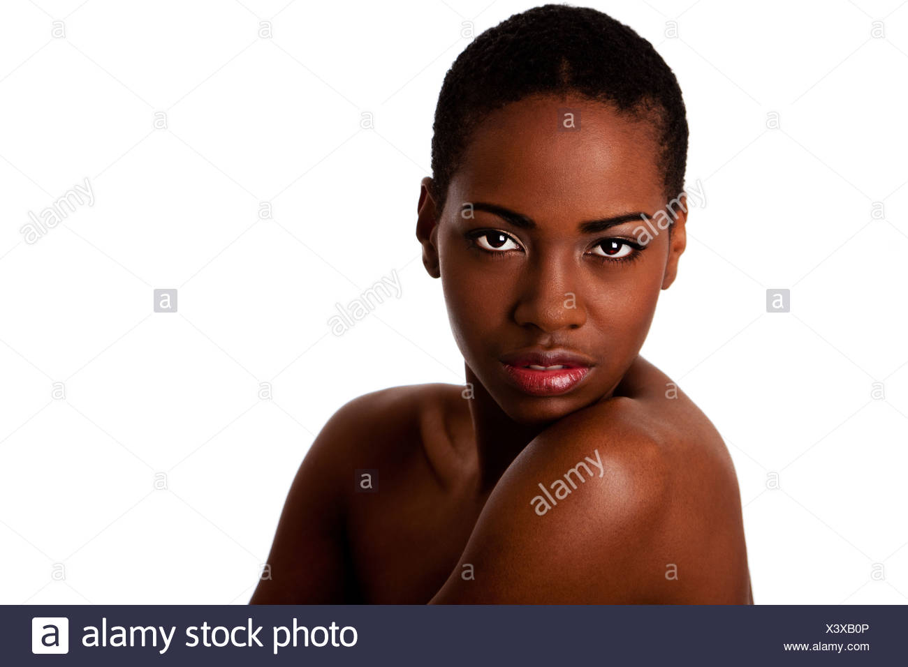 Beautiful African Female Face With Short Curly Hair Looking Over