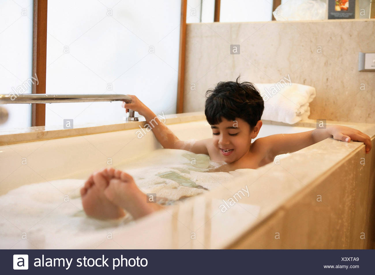 Boy Taking Bubble Bath Stock Photos & Boy Taking Bubble Bath Stock