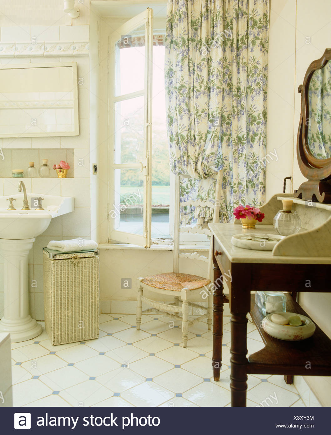 Marble Topped Washstand And White Tiled Floor In French Country