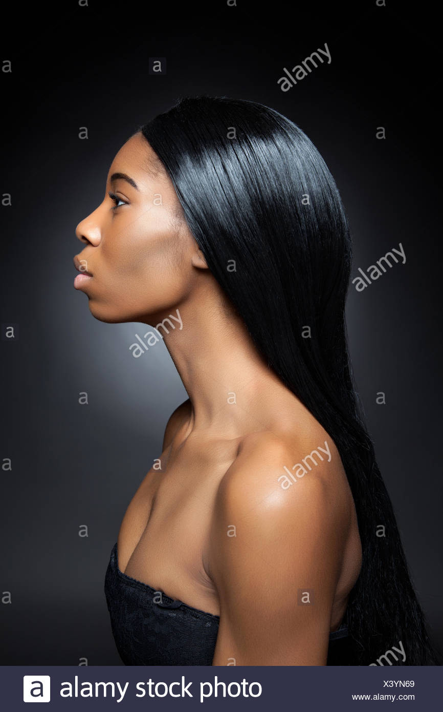 Beautiful Young Black Woman With Long Straight Hair Stock Photo