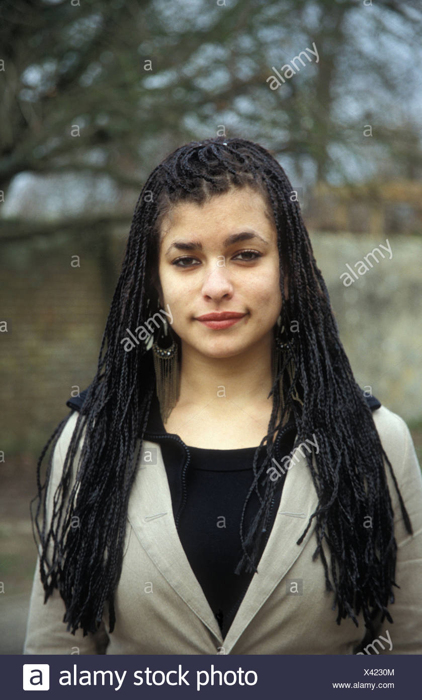 Portrait Mixed Race Teenage Girl With Long Braids Stock Photo