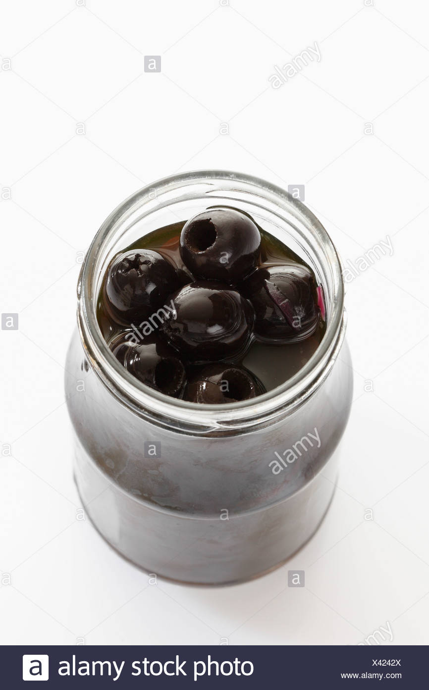 Download Black Olives In Glass Jar On White Background Stock Photo Alamy Yellowimages Mockups