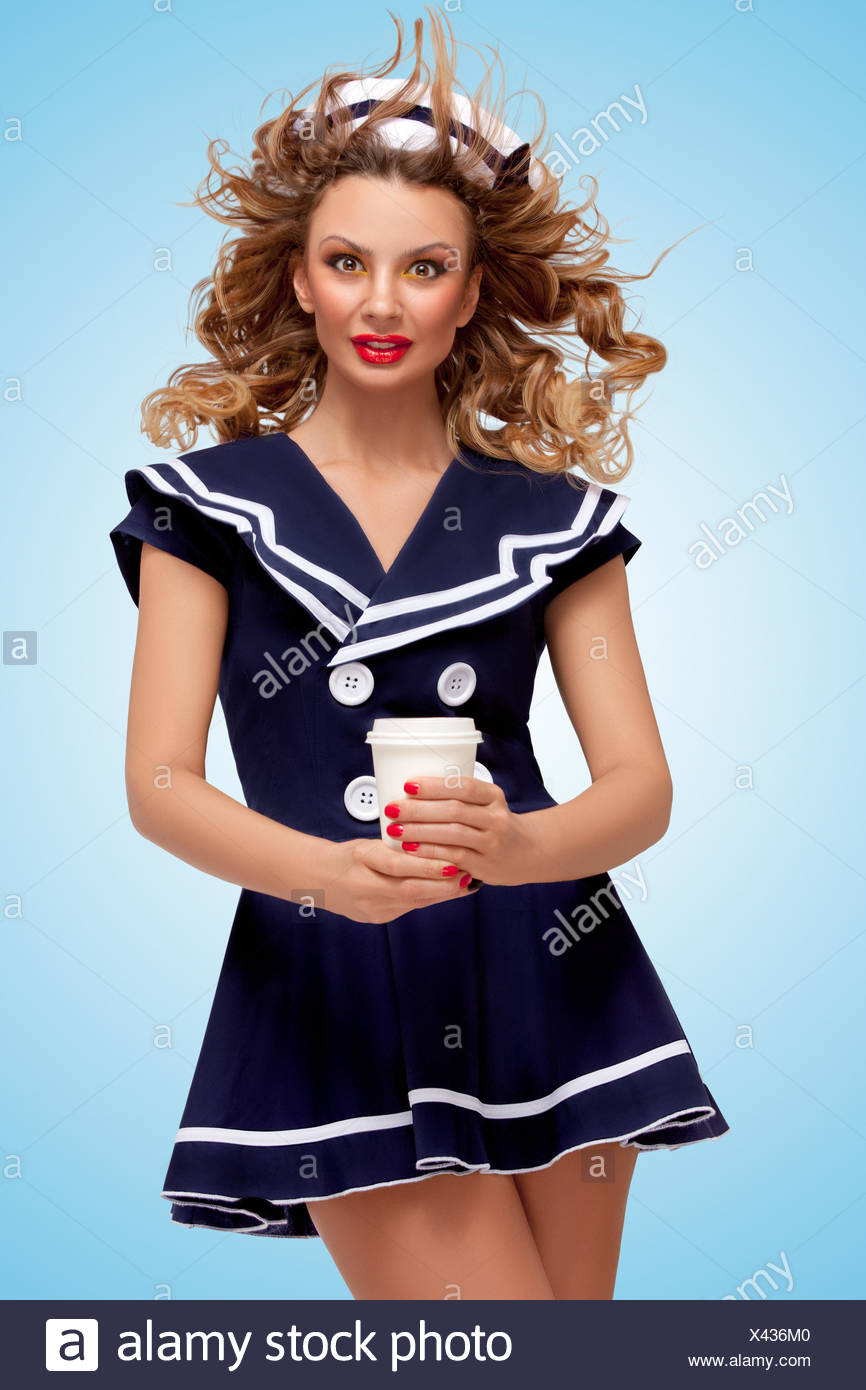 Creative Photo Of A Playful Pin Up Sailor Girl With A Coffee To Go