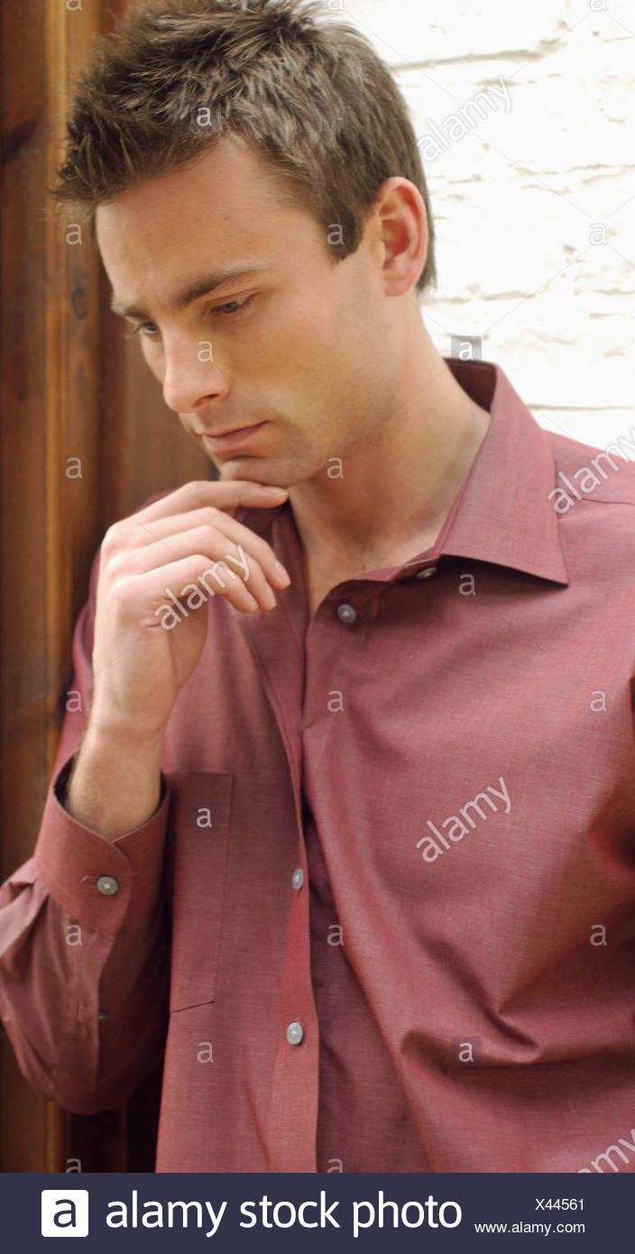 Male Short Brown Hair Wearing Dark Red Shirt Open At Neck