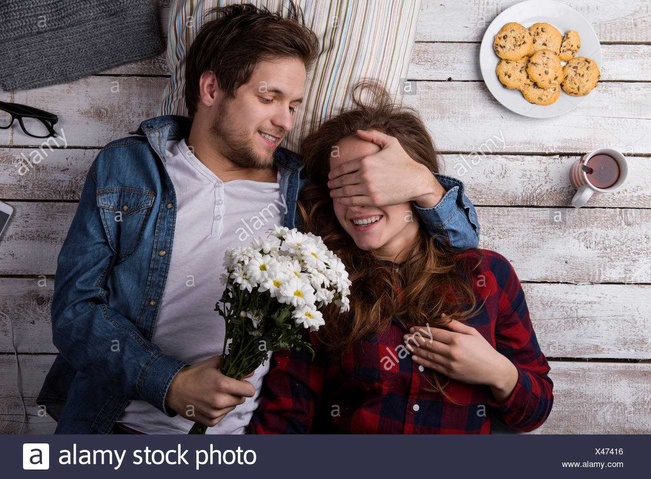 surprising girlfriend with flowers