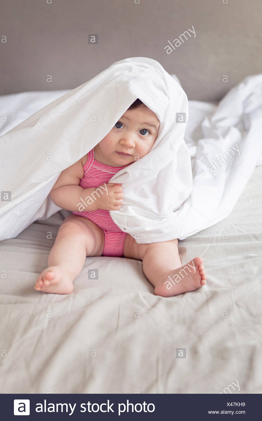 Girls Hiding Under Bed Sheet Stock Photos & Girls Hiding Under Bed Sheet Stock Images Alamy