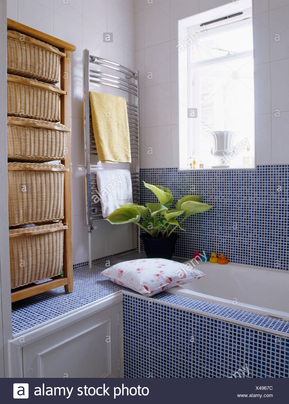 Blue Mosaic Tiled Wall Bath Surround In Small Bathroom With Tall