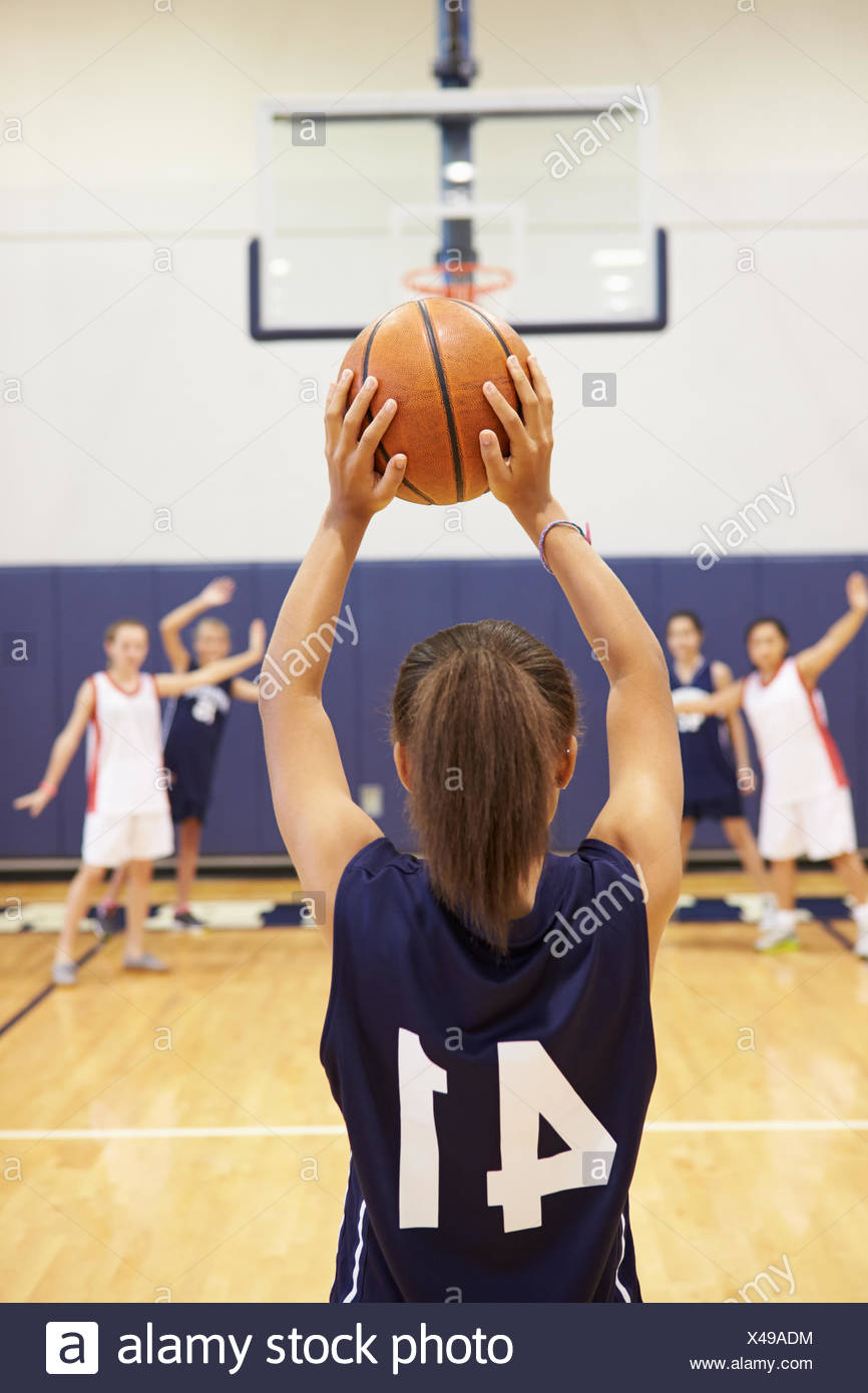 Female High School Basketball Player Shooting Basket Stock Photo - Alamy