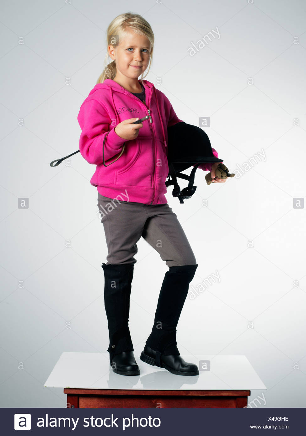 girl in riding-boots Stock Photo 