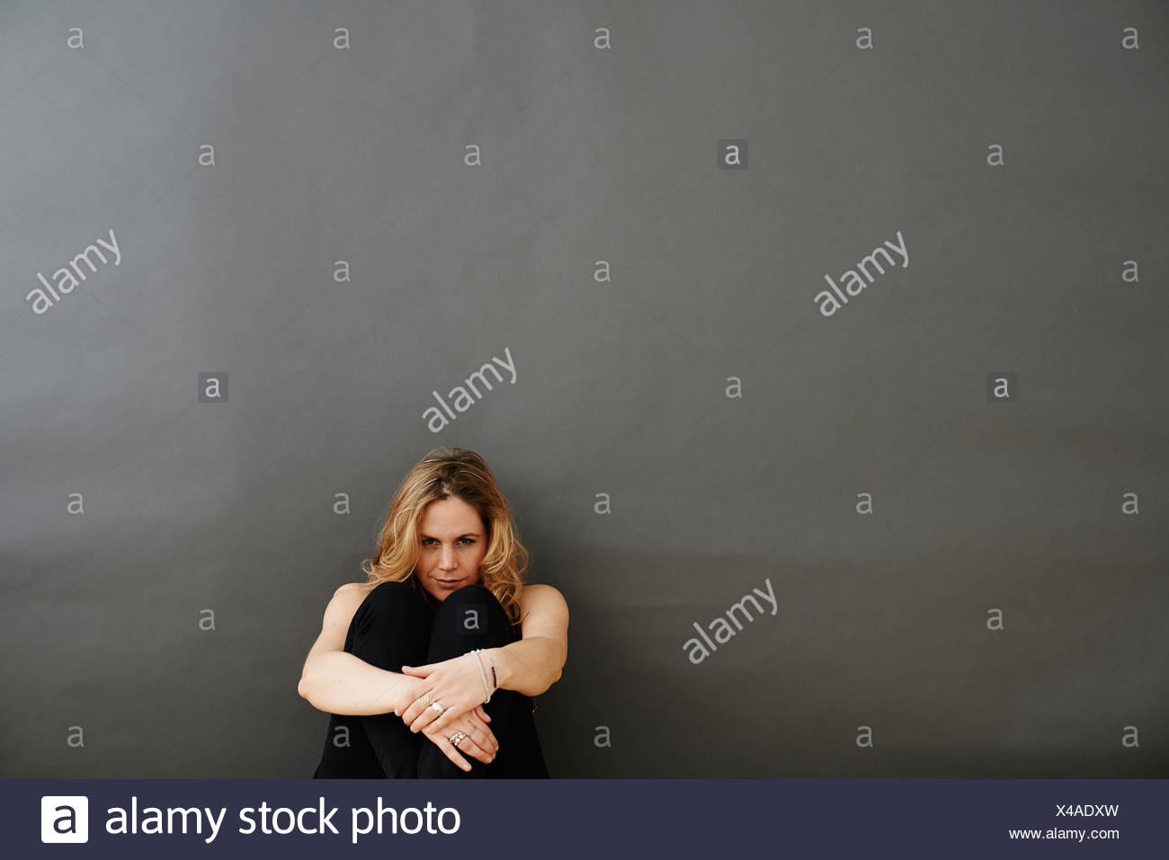 Featured image of post Man Hugging Knees To Chest Drawing