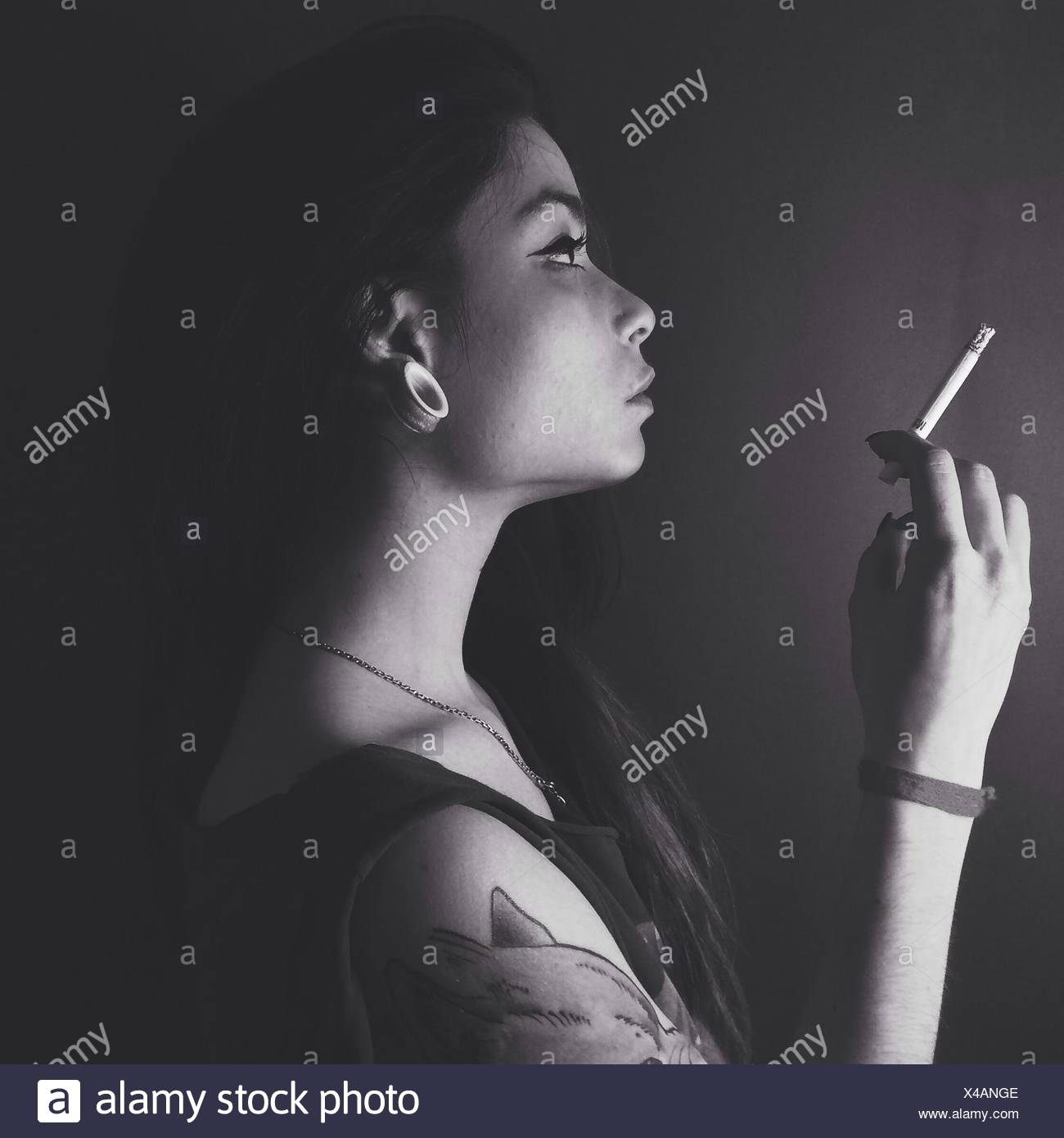 Smoking Side View High Resolution Stock Photography and Images Alamy