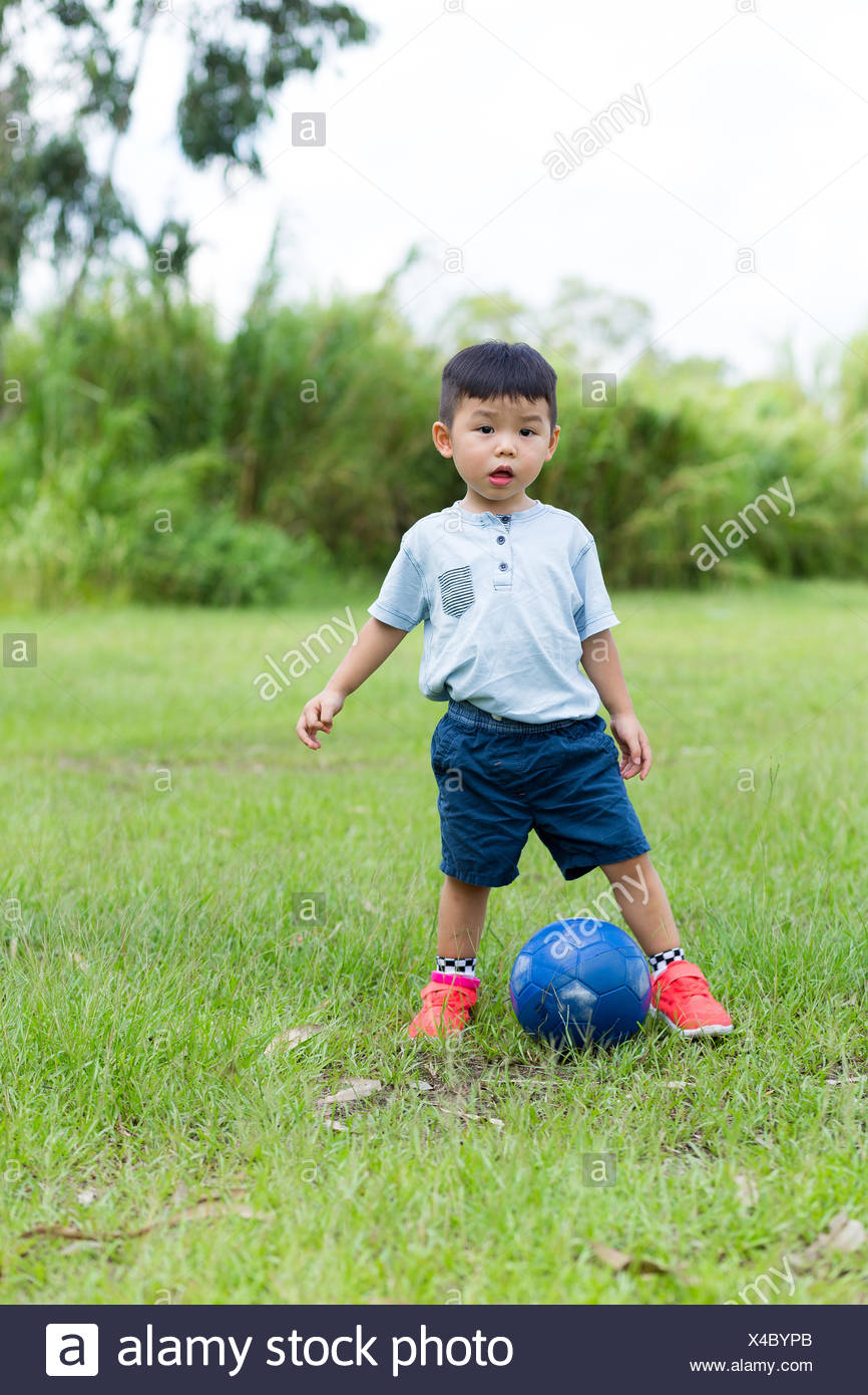 baby kicking soccer ball