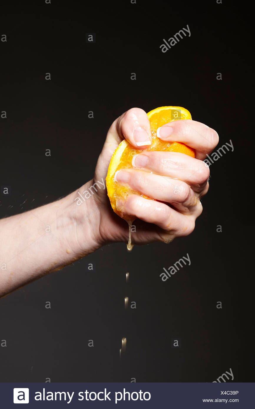 Hand Squeezing Orange High Resolution Stock Photography and Images Alamy