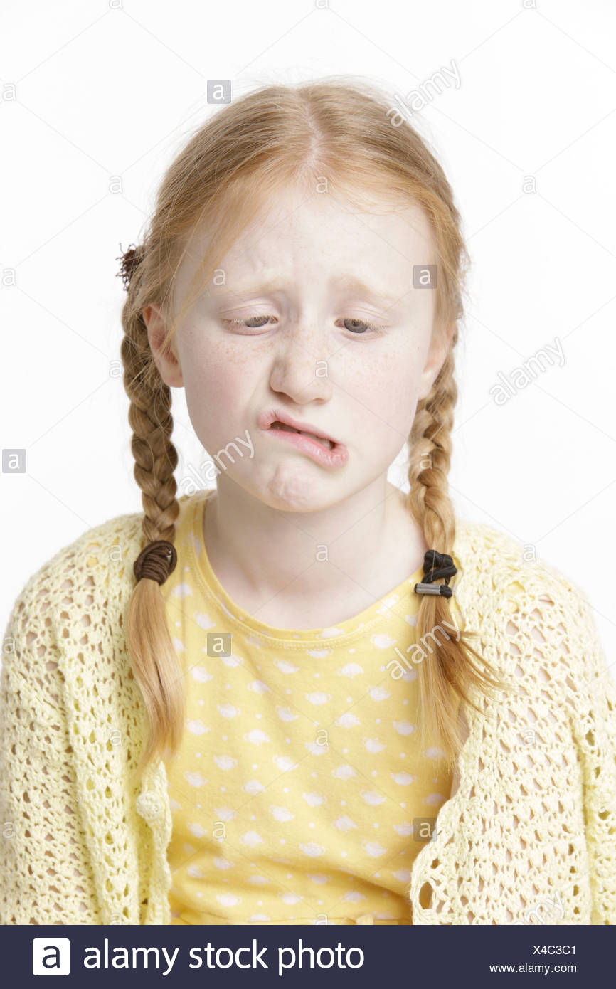 Girl 8 Years Old With Braided Hair Making A Face Stock Photo