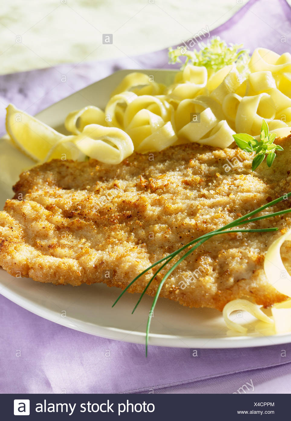 Escalope Milanaise And Tagliatelles Stock Photo Alamy