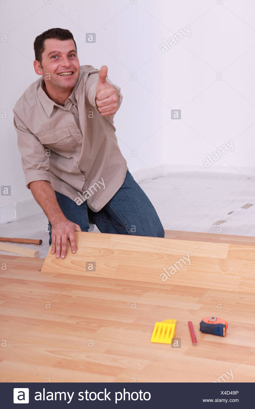 Man Laying Wooden Flooring At Home Stock Photo 278113298 Alamy