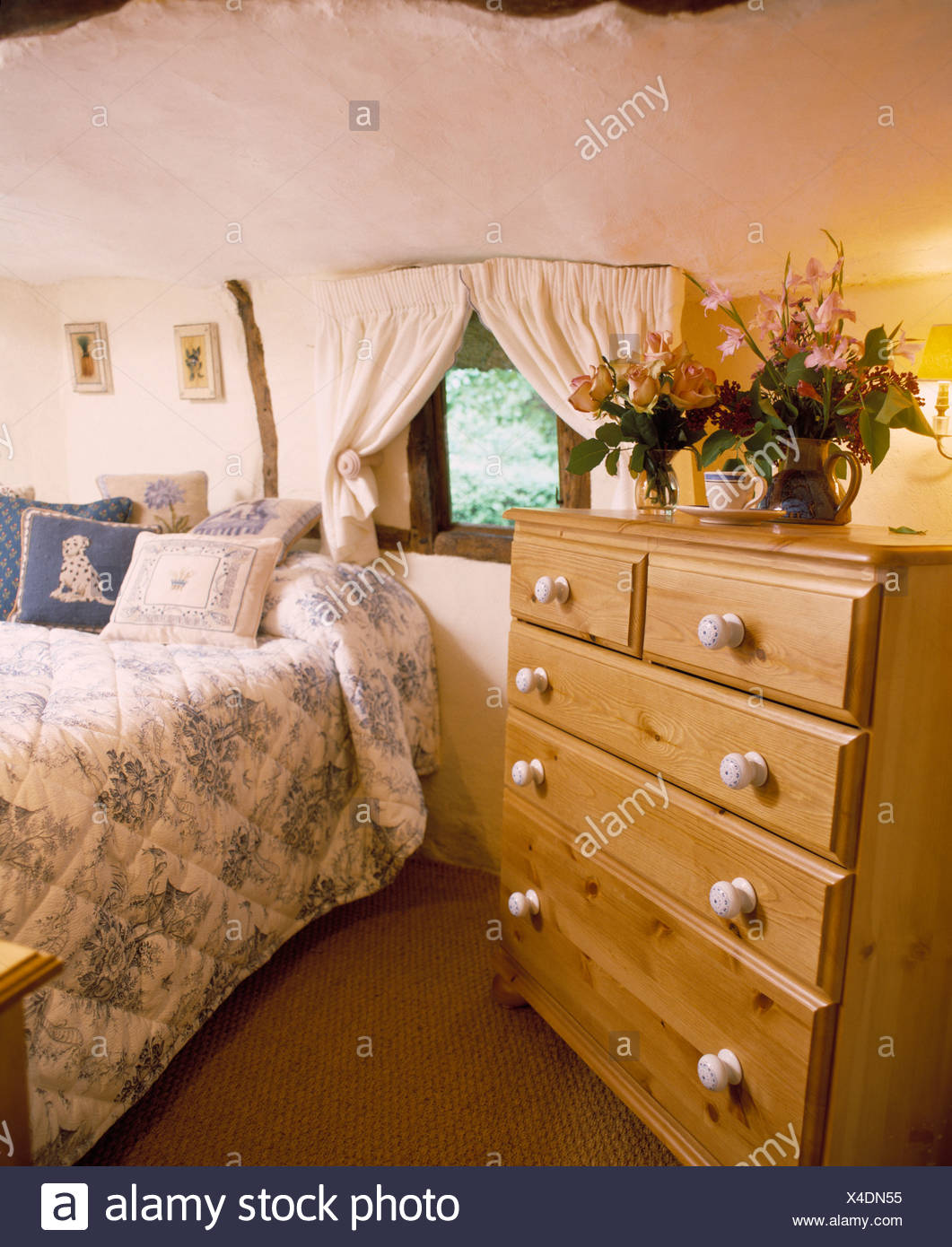 Pine Chest Of Drawers In Small Cottage Bedroom With Blue White