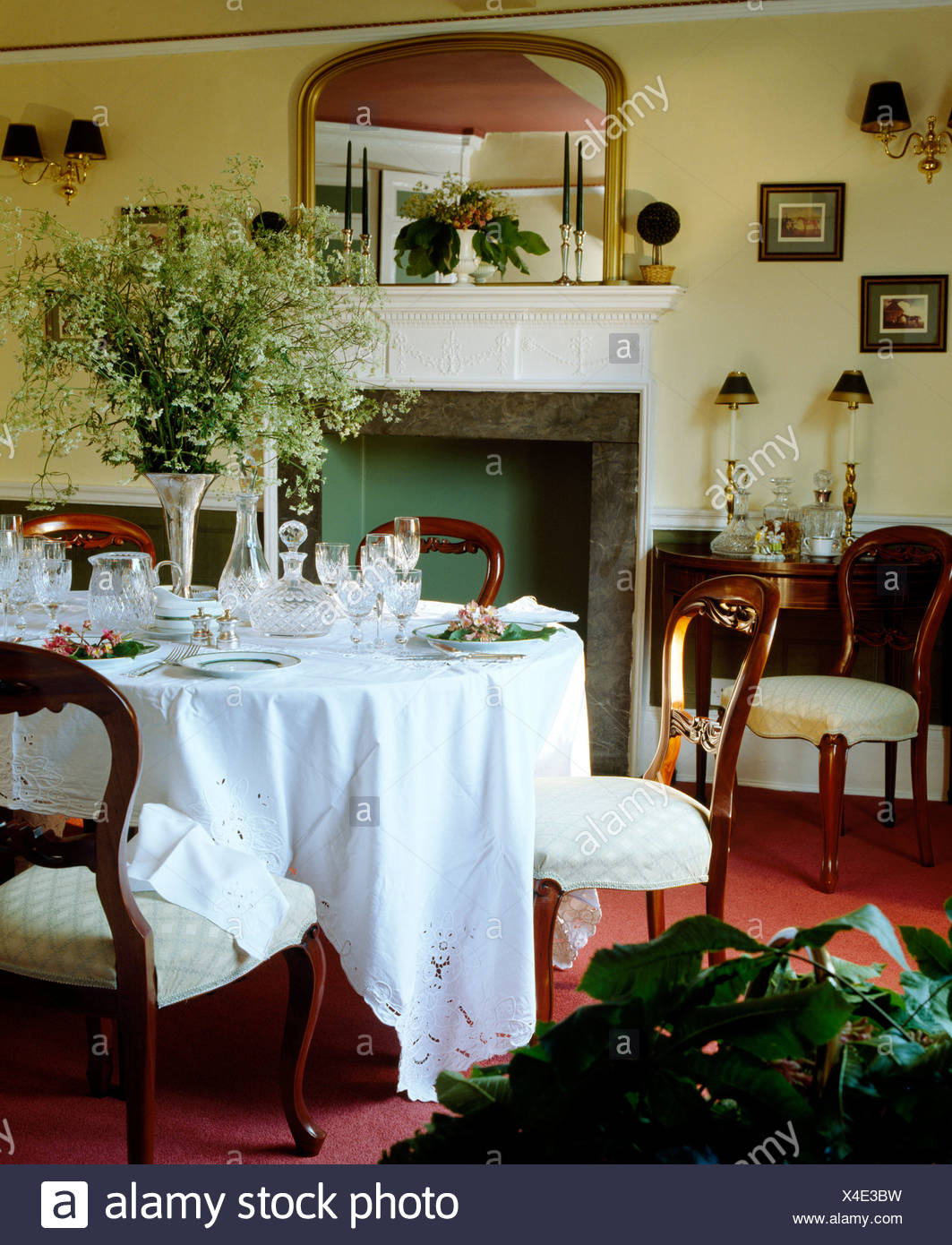 Vase Of Cow Parsley On Table Set For Lunch With White