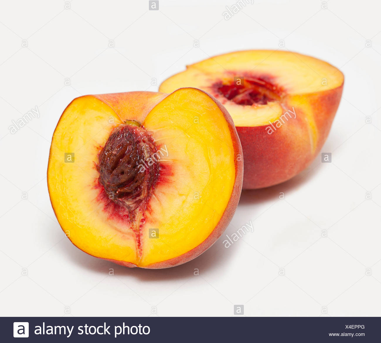 Peach Cut In Half High Resolution Stock Photography And Images Alamy