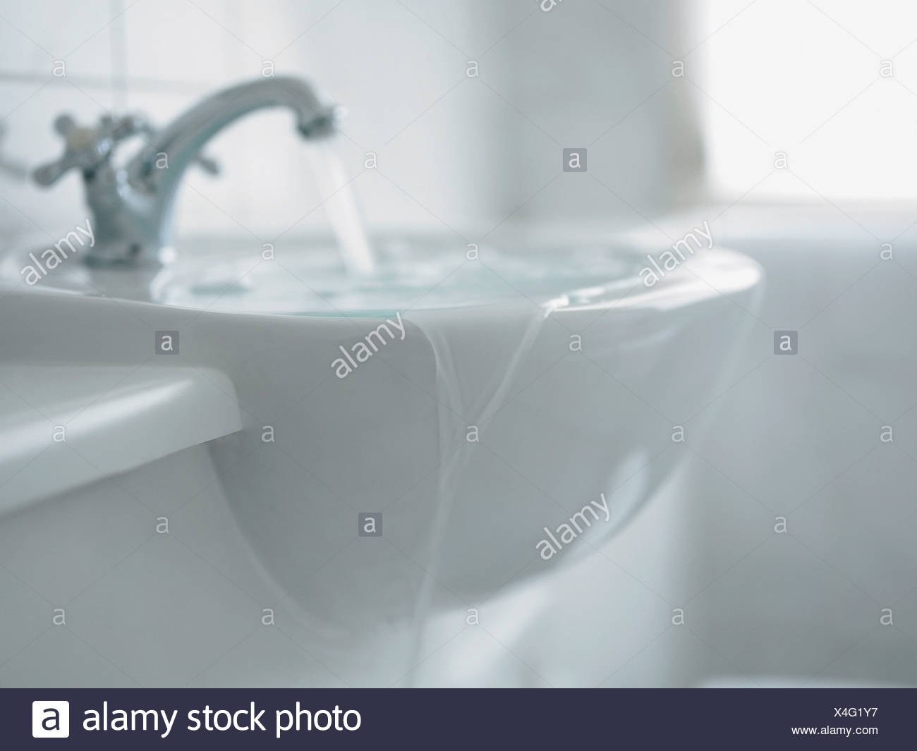 Close Up Of Overflowing Bathroom Sink Stock Photo 278177291
