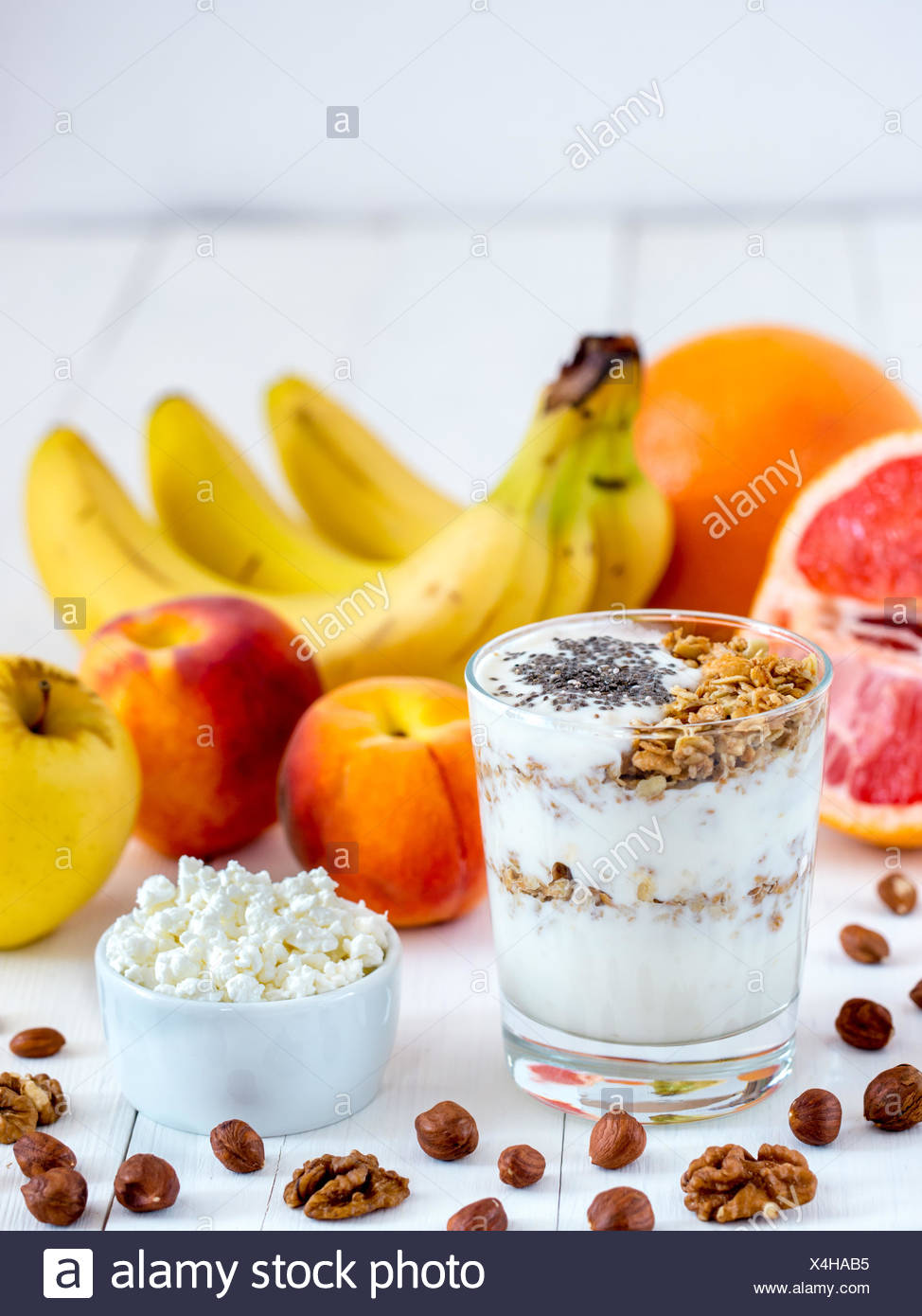 Cottage Cheese Yogurt Fruits And Nuts Vertical Stock Photo