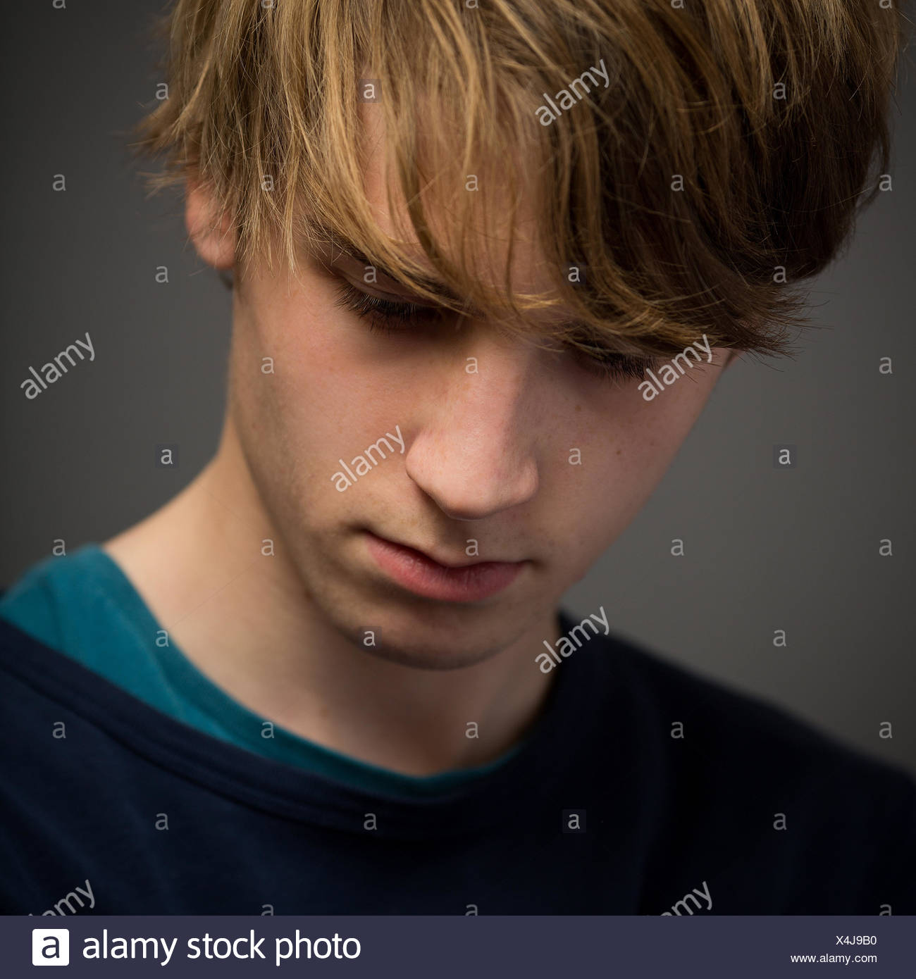 Confident Teenage Blond Young Man In The Studio Stock Photo Alamy