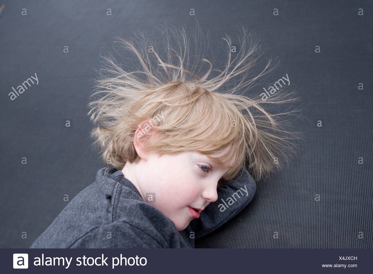 Static Electricity Makes A Young Boy S Hair Messy Stock Photo