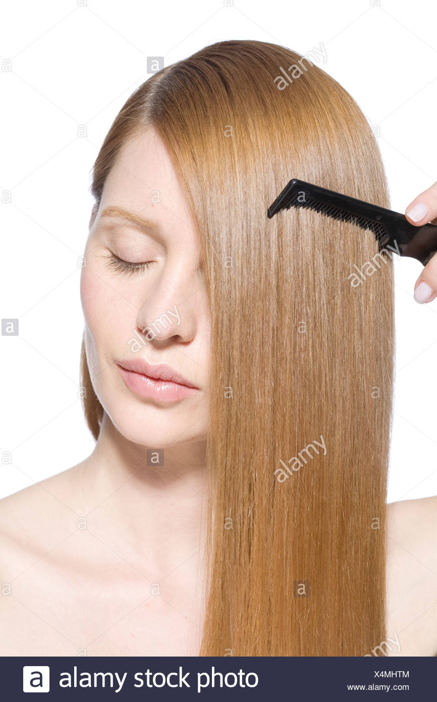 Female Combing Long Straight Fair Hair With Black Plastic Hair