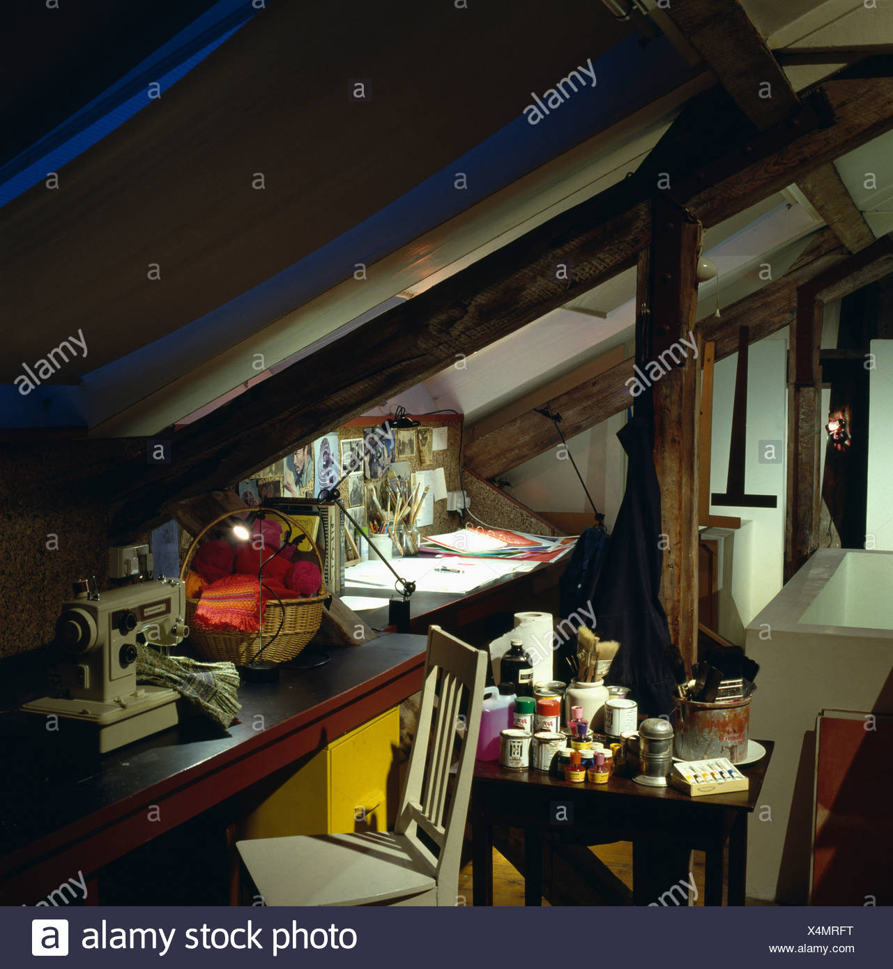 Electric Sewing Machine On Table Fitted Below Eaves In