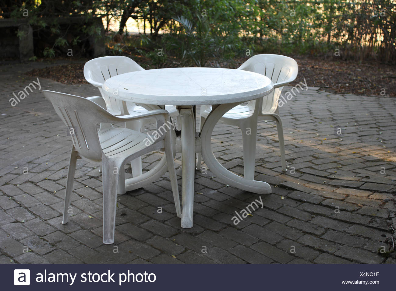 Plastic Chairs And Table High Resolution Stock Photography and Images