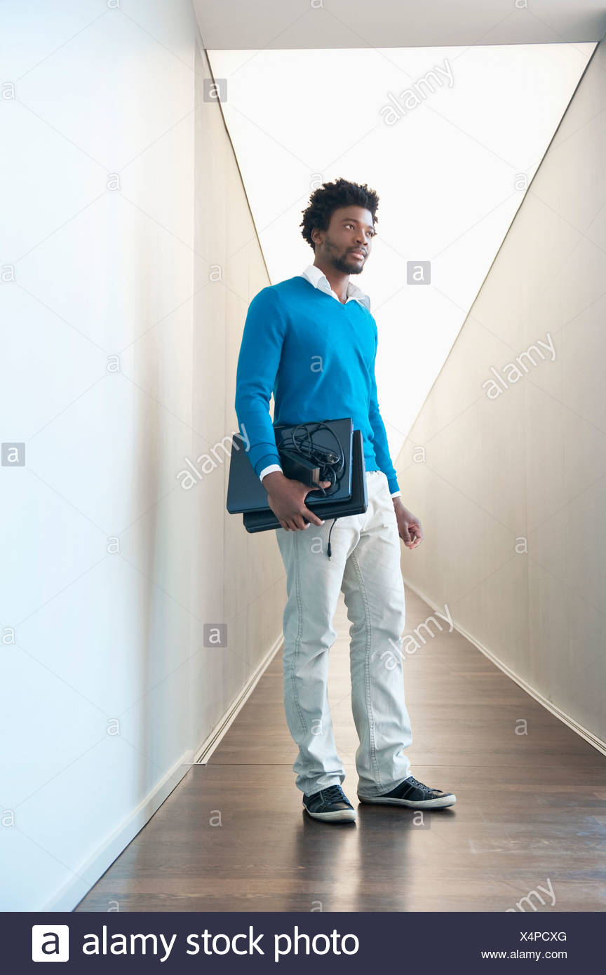 carrying two laptops