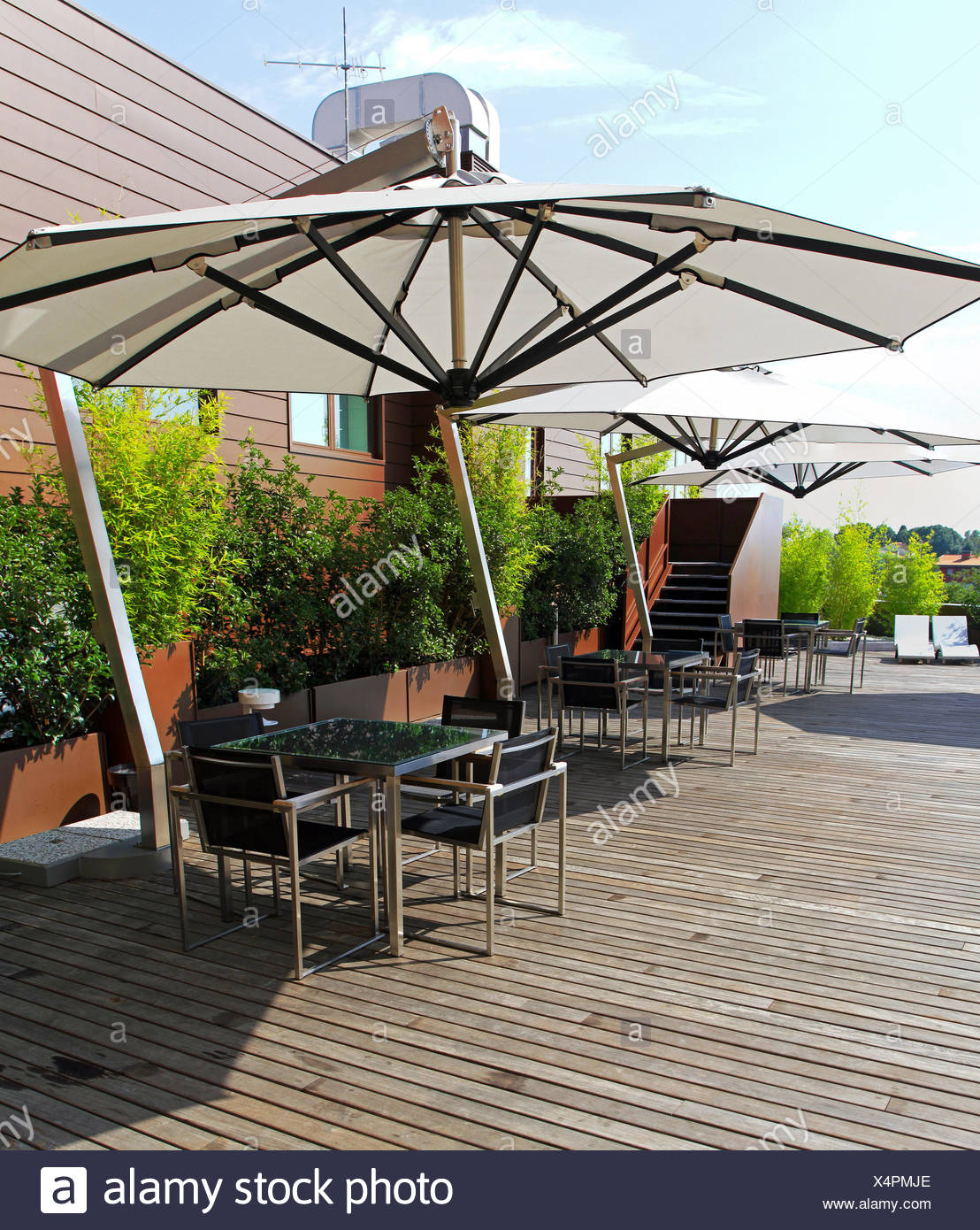Rooftop Terrace With Small Green Garden Oasis Stock Photo