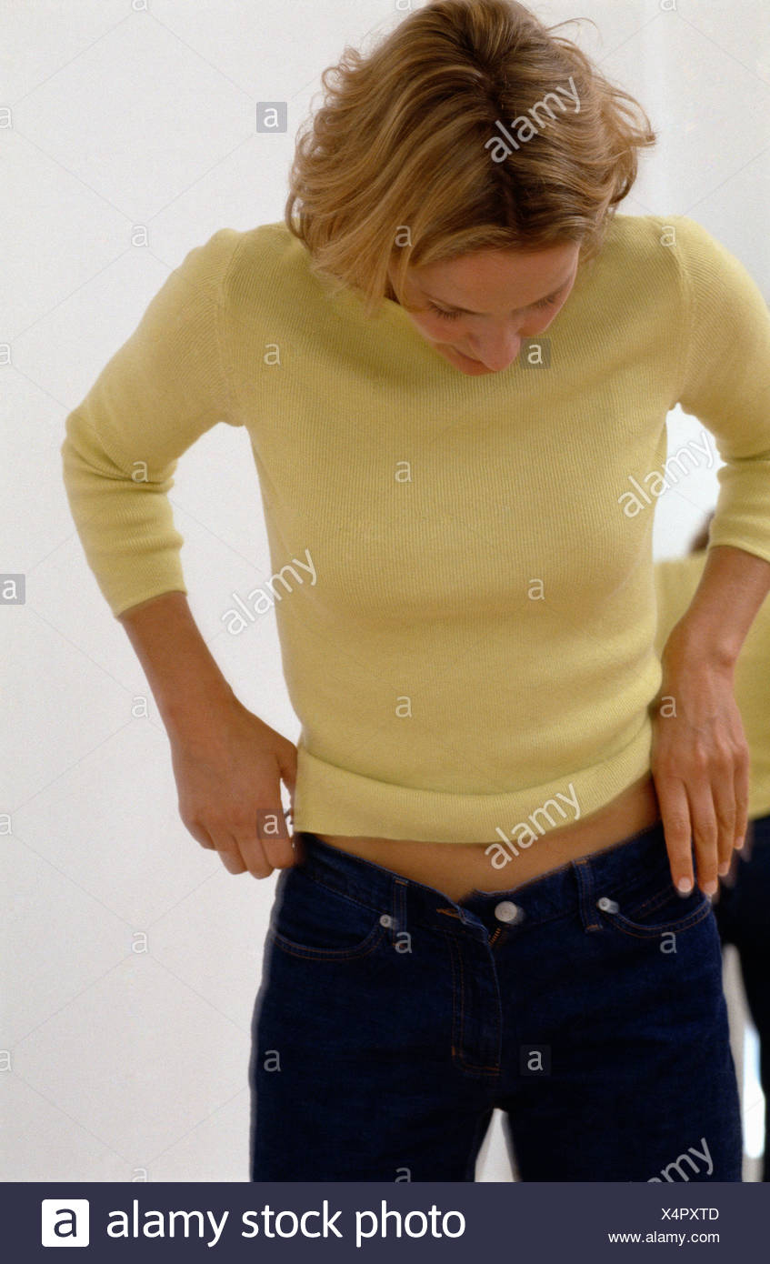 yellow jumper blue jeans