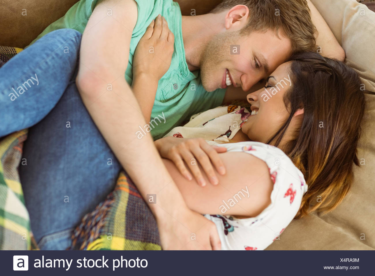 Cute Couple Cuddling On Couch Stock Photo 278337520 Alamy