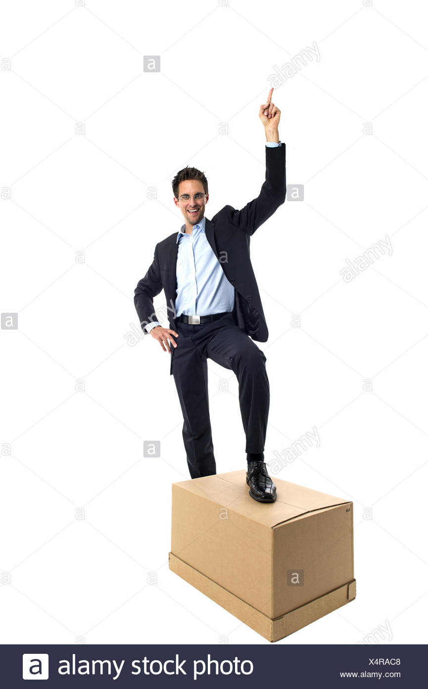 Businessman with a box Stock Photo