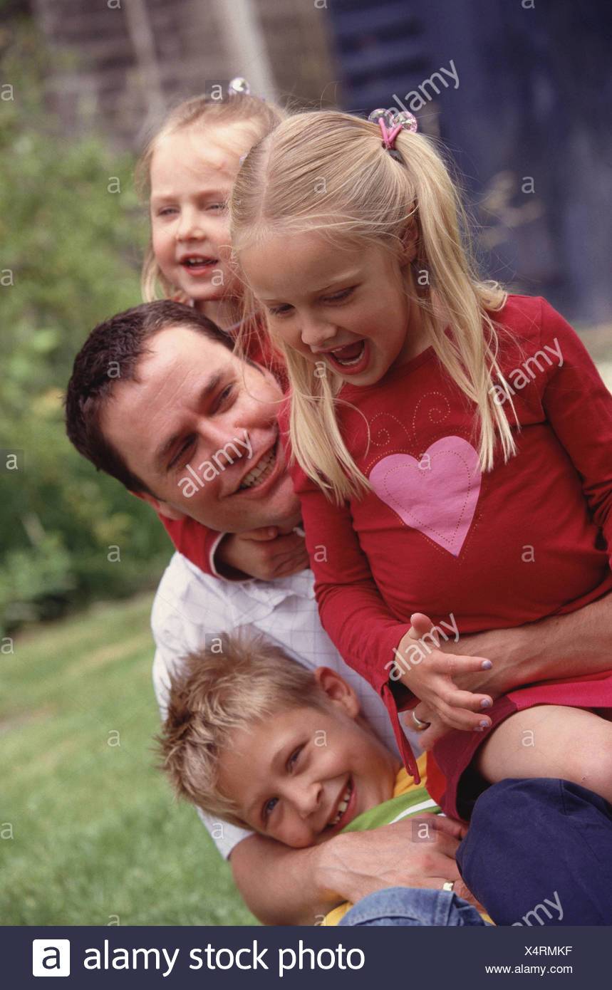Father Short Brown Hair Male Child Spiky Blonde Hair Two Female