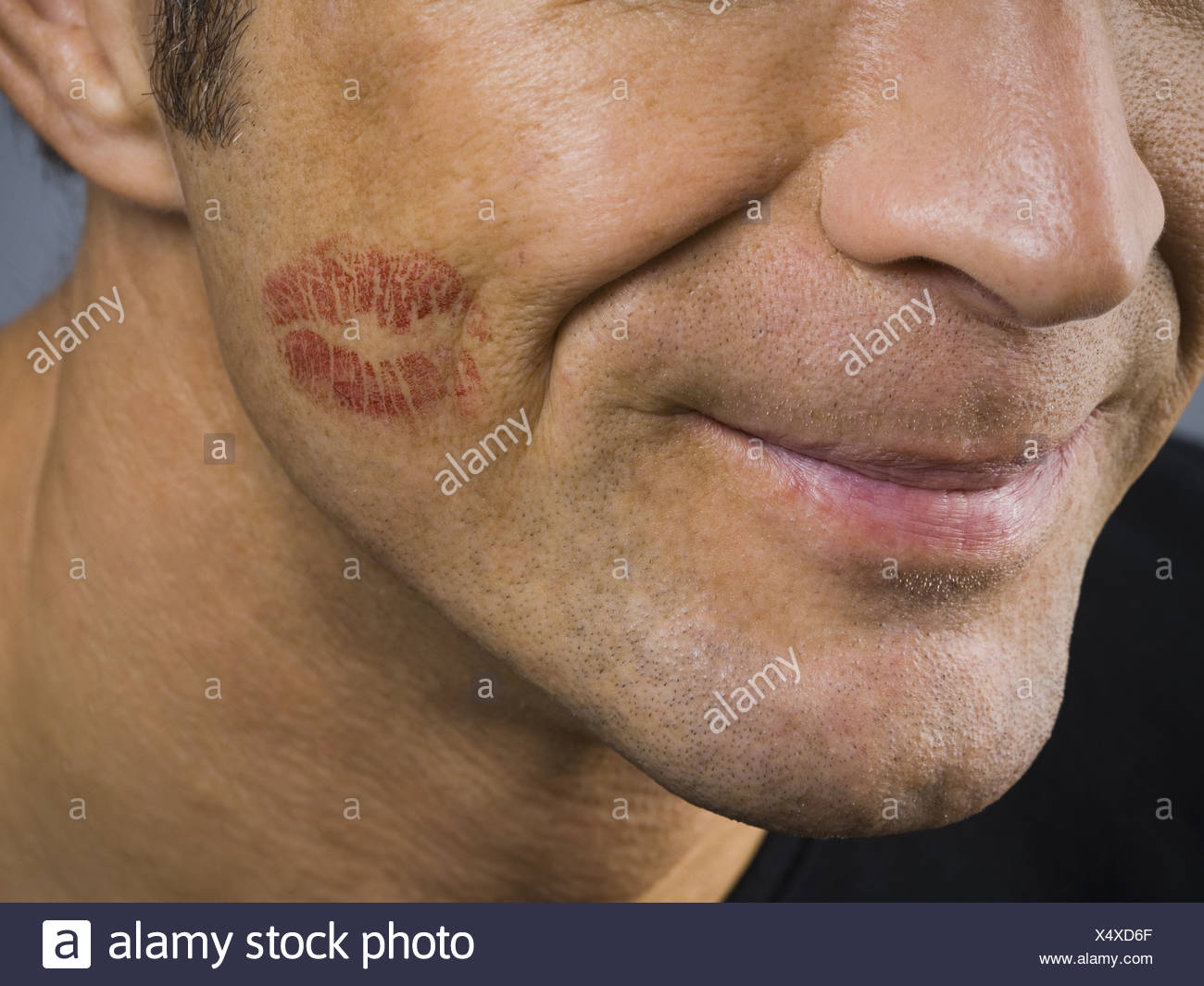 Lipstick Kiss On The Cheek High Resolution Stock Photography and Images