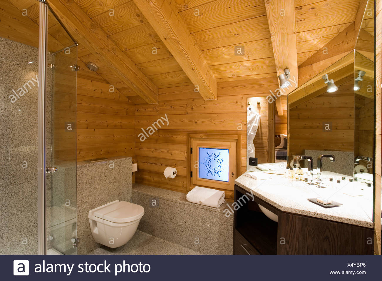 Wooden Ceiling And Walls In Alpine Chalet Bathroom Stock Photo