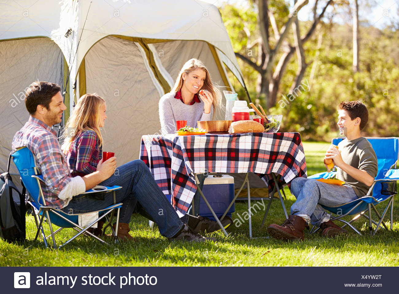 Family Enjoying Camping Holiday In Countryside Stock Photo Alamy