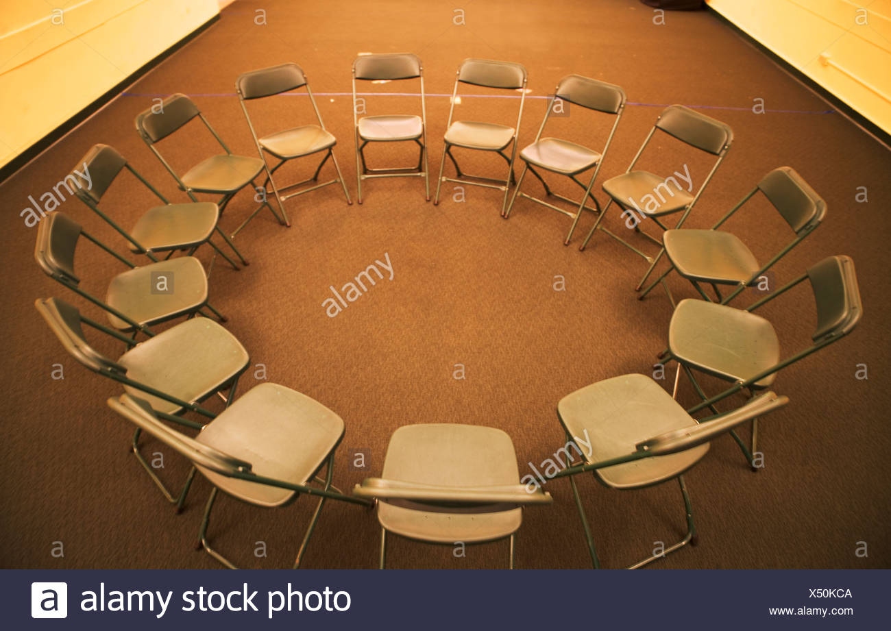 Empty Folding Chairs In Circle Stock Photo Alamy