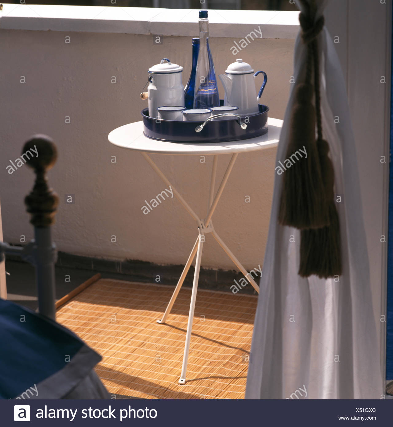 Enamel Coffeepot On Tray On Small Table In Sunny Corner Of