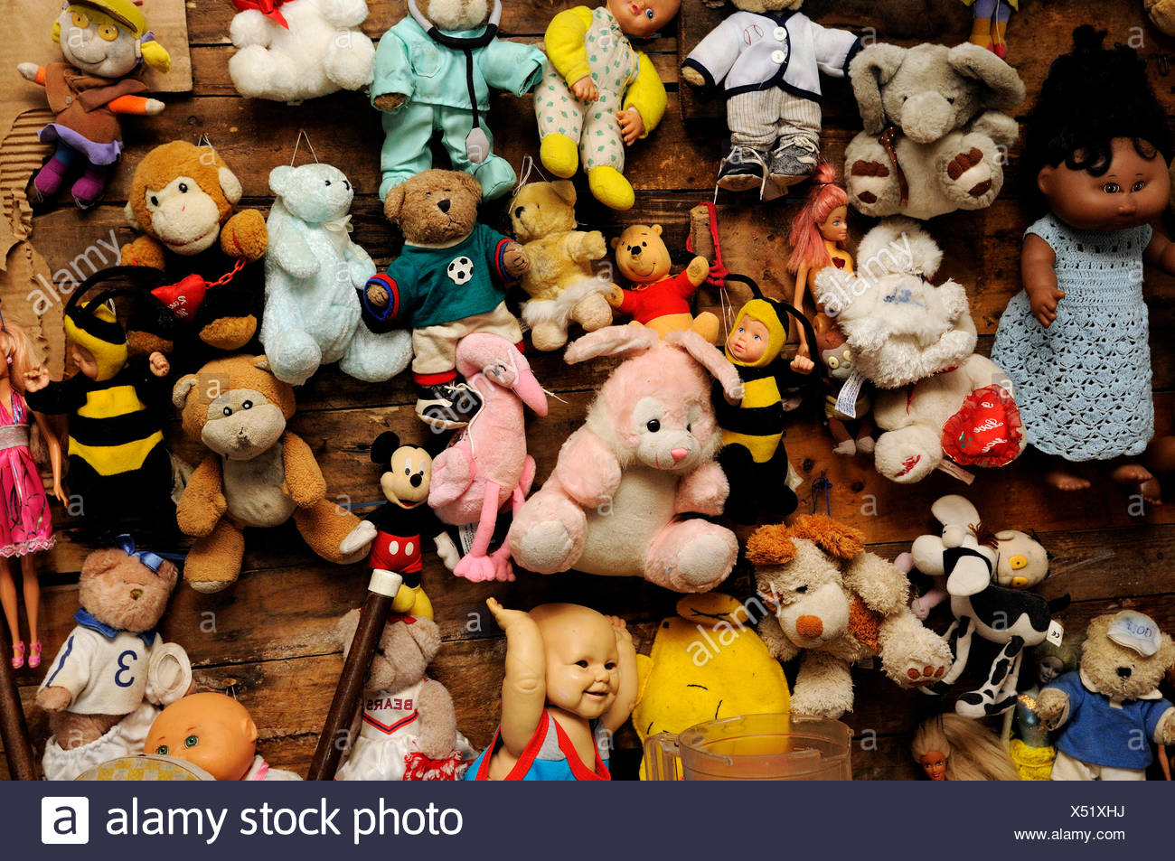 hanging dolls on wall