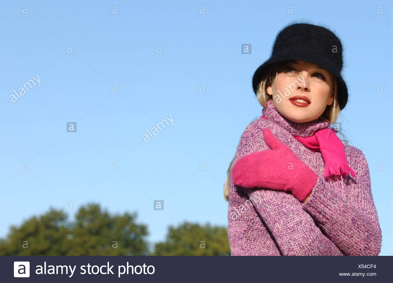 Female Long Blonde Hair Brown Tones Of Make Up Wearing Black