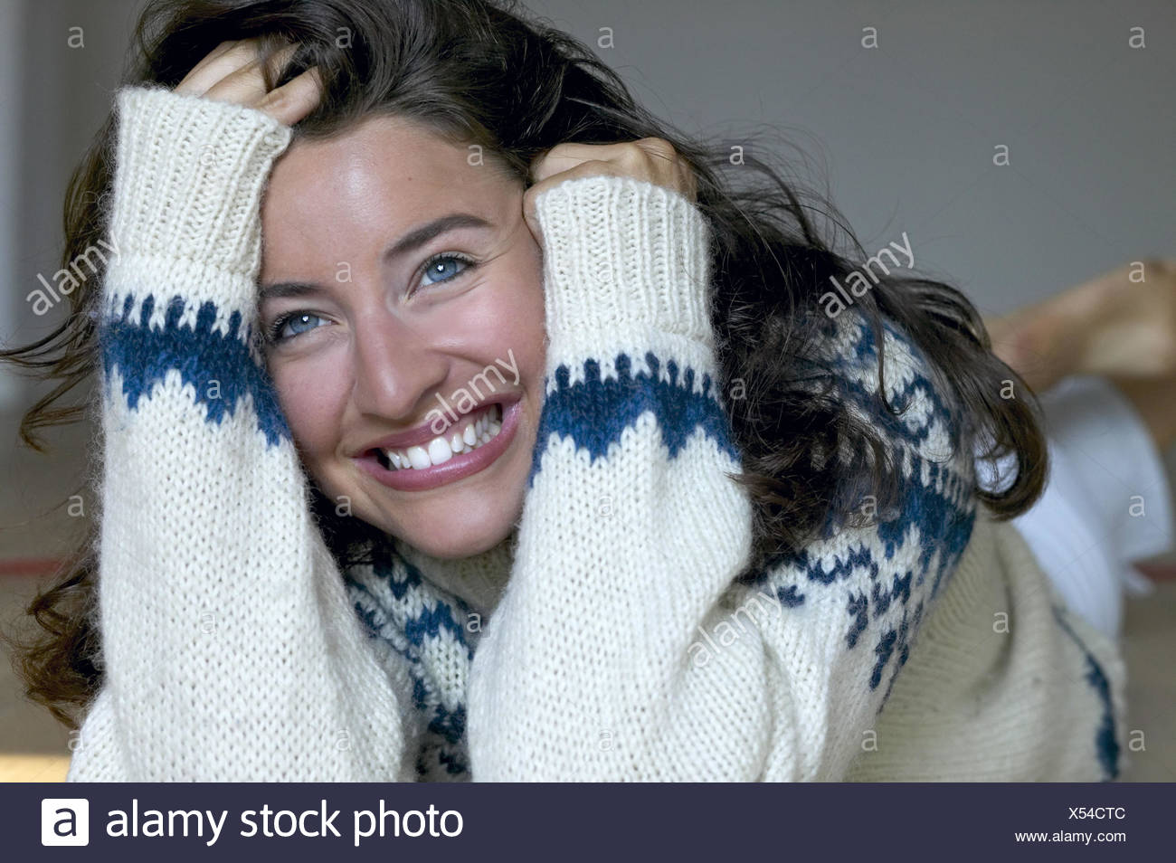 Woman Young Long Haired Rope Sweaters Laughs Portrait Series 20 30 Years Brown Hairy Winter Sweaters Sweaters Lie Rests Cheerfully Joy Woman Young Long Haired Rope Sweaters Laughs Portrait Series 20 30 Years Brown Hairy Winter Sweaters Sweaters Lie Rests Cheerfully Joy
