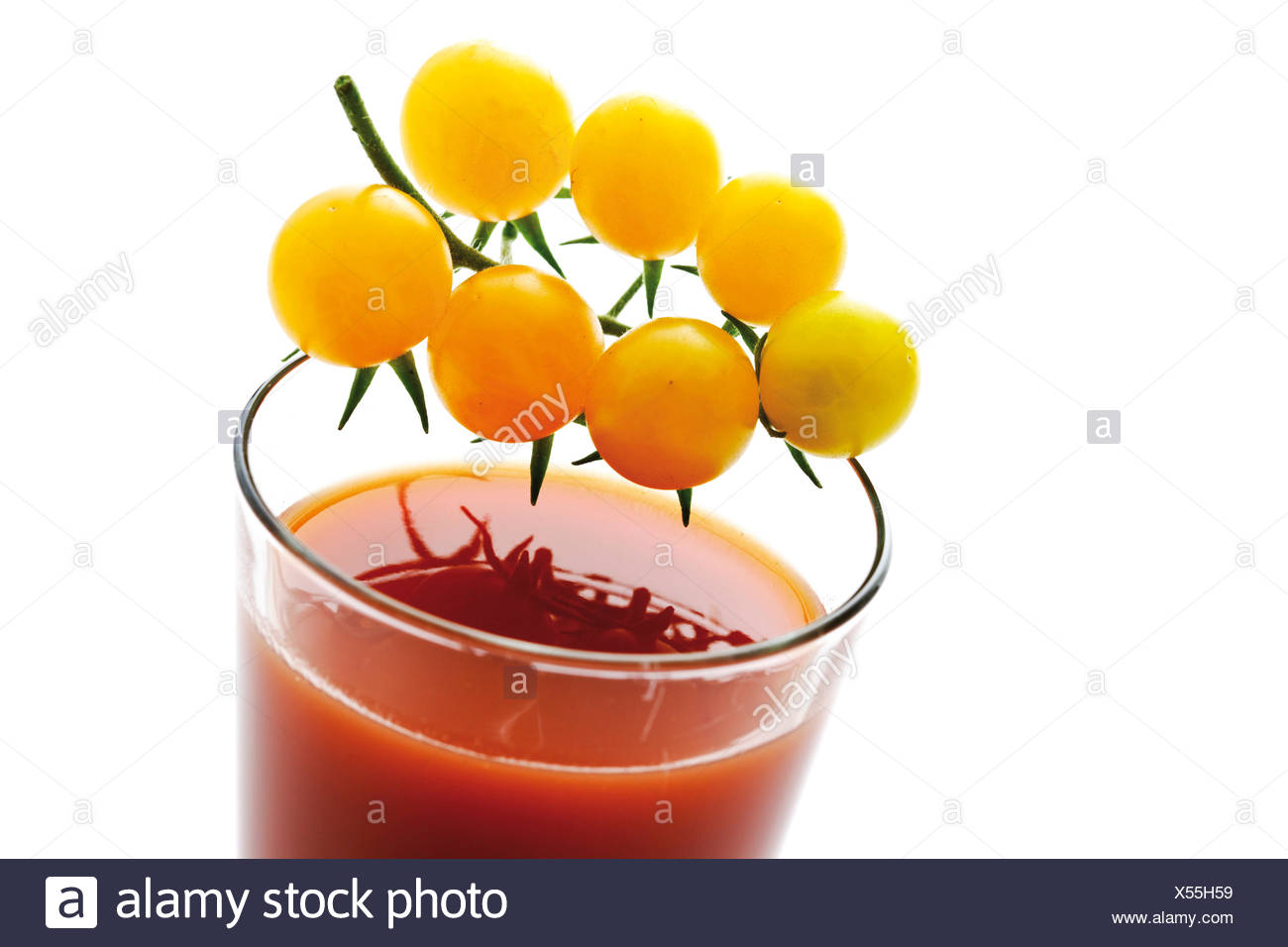 Download Yellow Cocktail Tomatoes On A Glass Of Tomato Juice Stock Photo Alamy Yellowimages Mockups