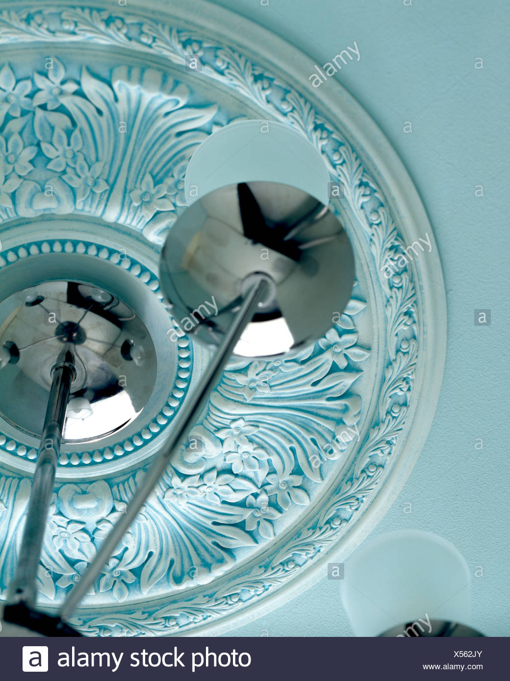 Pastel Blue Plaster Ceiling Rose And Chrome And Glass Light