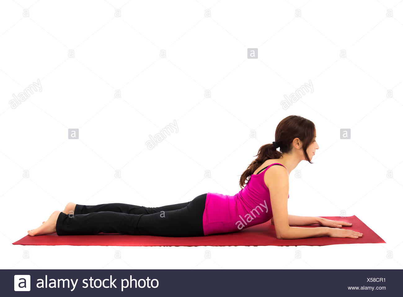 Young woman doing Sphinx Pose in Yoga (Series with the same model Young woman doing Sphinx Pose in Yoga (Series with the same model
