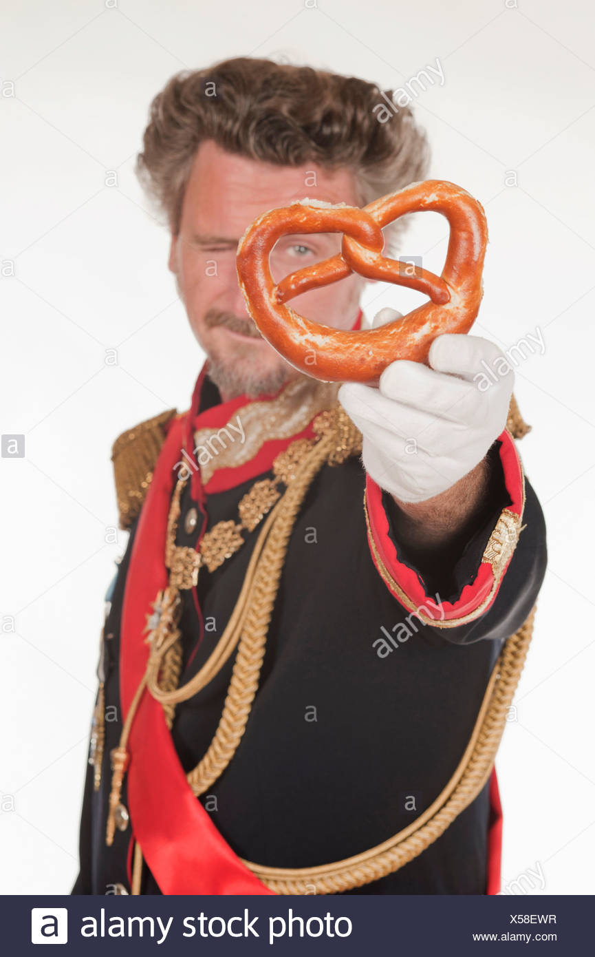 Man As King Ludwig Of Bavaria With Pretzel Stock Photo Alamy