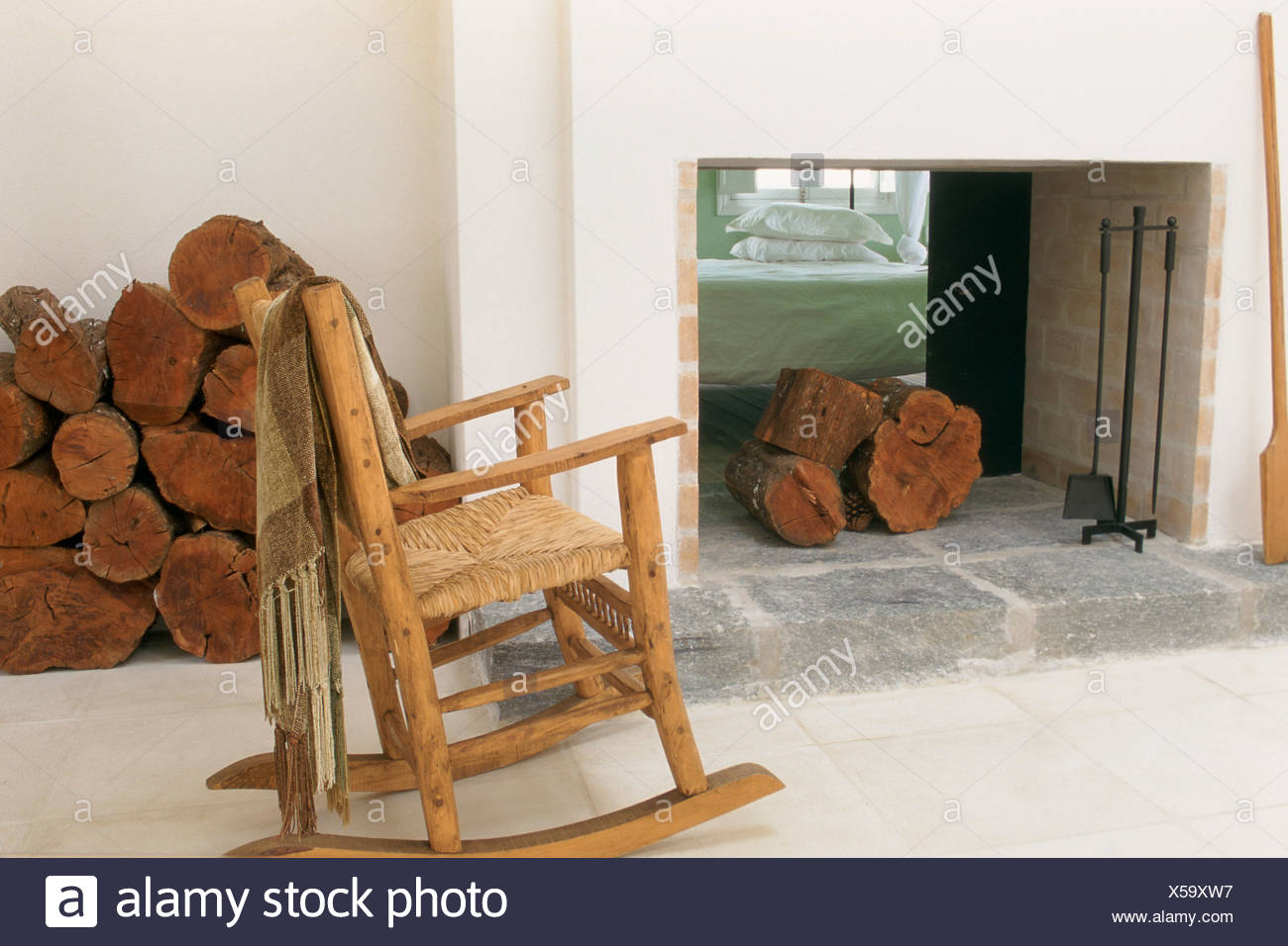 Living Room Chimney Rocking Chair Wood Heaped Stock Photo Alamy - home fireplace roblox id