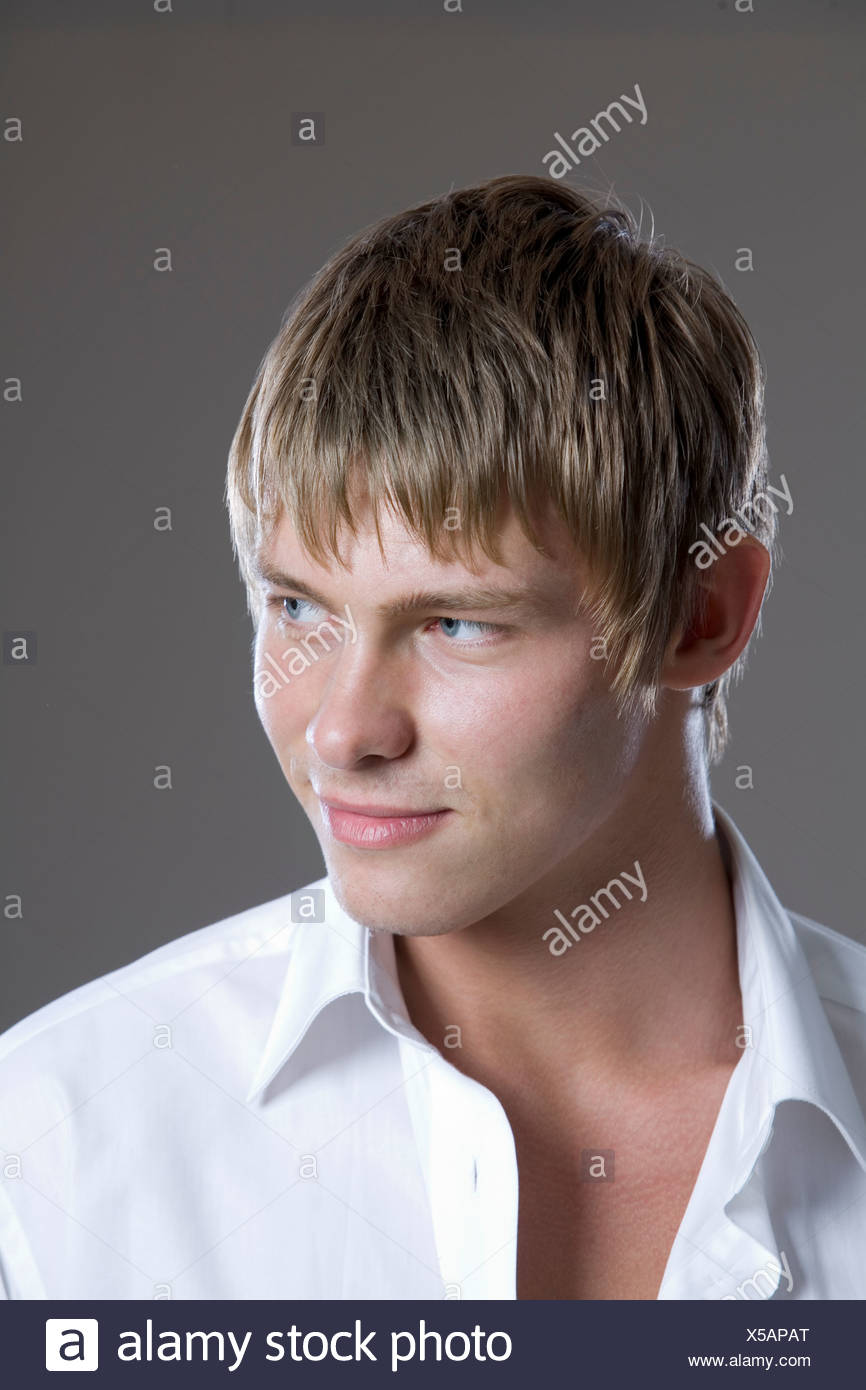 Young Man In Open Collar Shirt Stock Photo Alamy